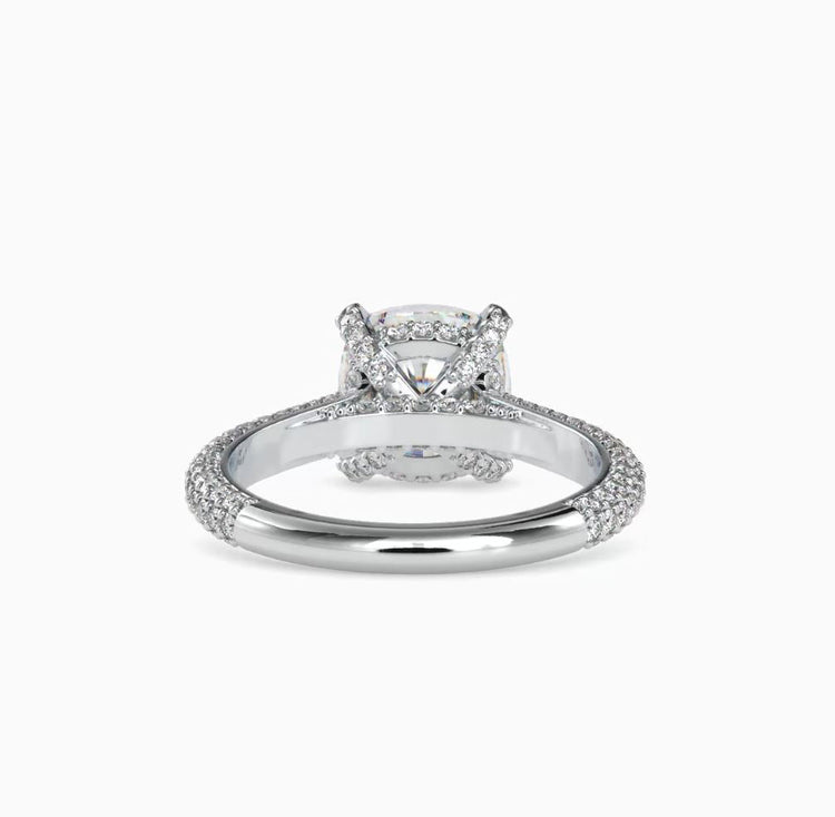 Yellow gold diamond ring with custom cushion setting.
