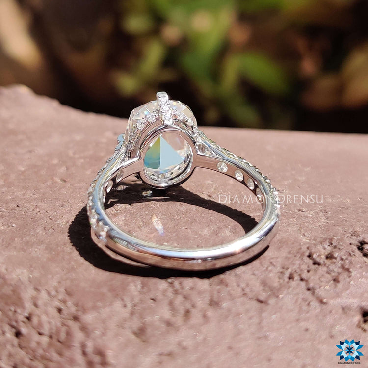 Round cut pave band with rose cut moissanite center stone.
