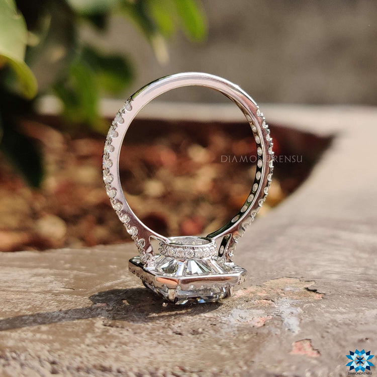 Custom engagement ring showcasing radiant cut moissanite and halo setting.
