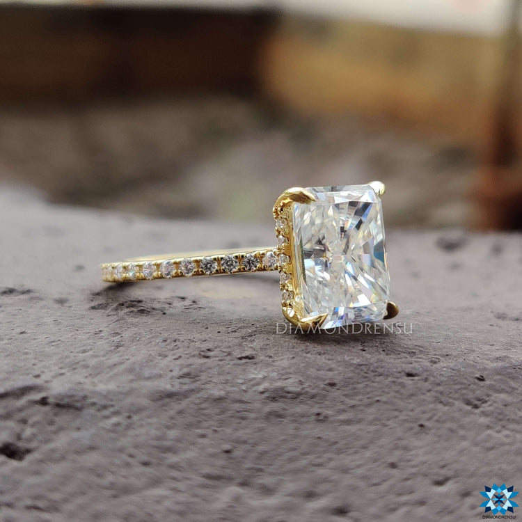 Handmade moissanite ring with pave setting.
