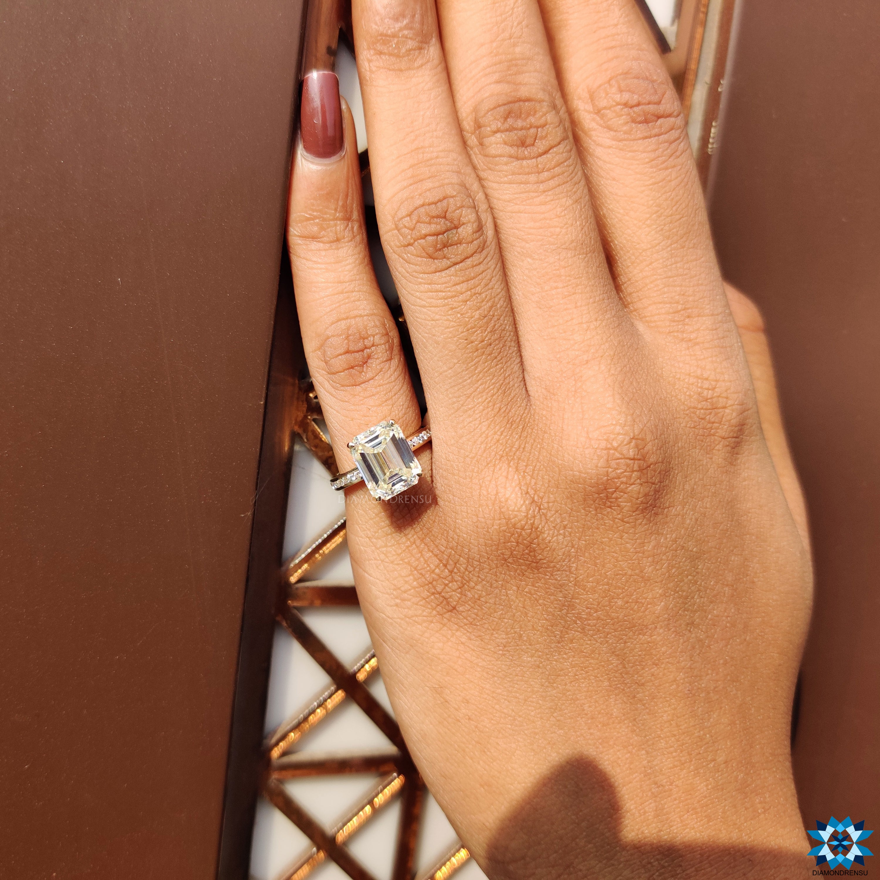 Pave setting ring in yellow gold with hidden halo and claw prongs.
