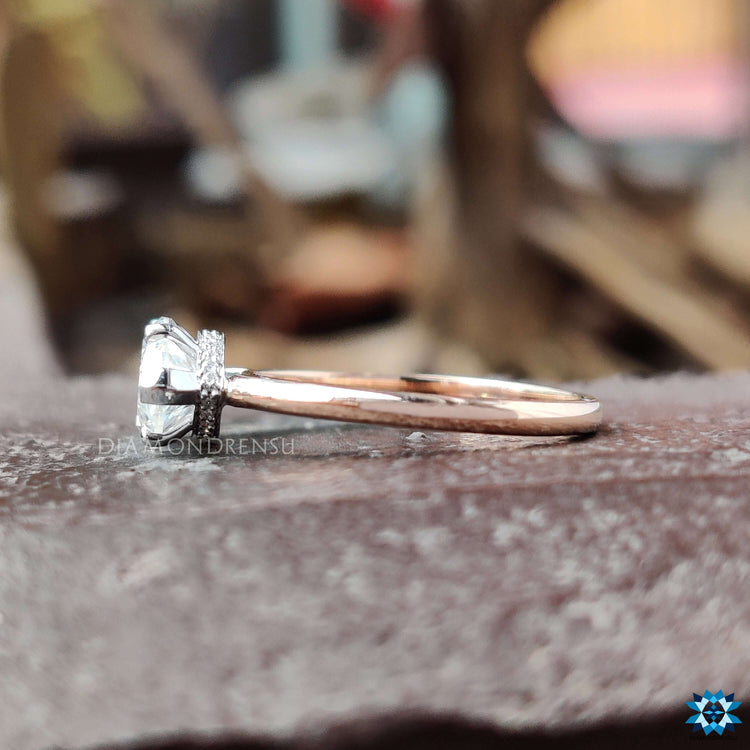 White and rose gold marquise ring with 6 prong setting.
