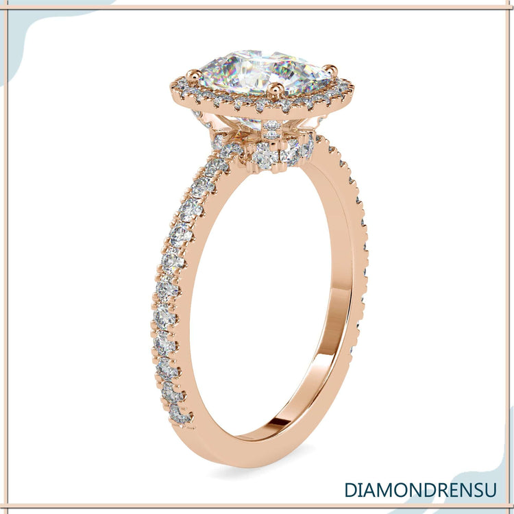 Round cut pave band with cushion cut diamond.
