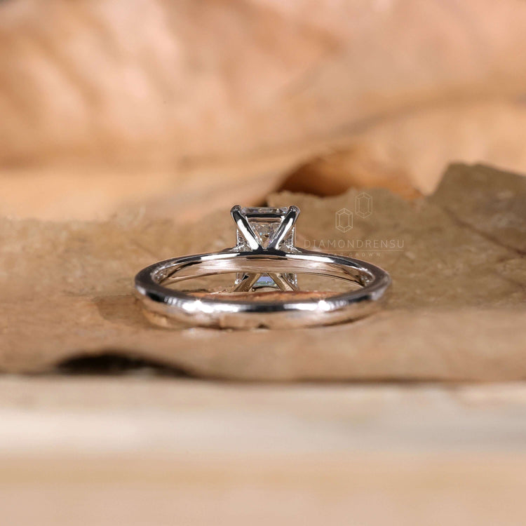 Gold solitaire engagement ring for a timeless proposal.