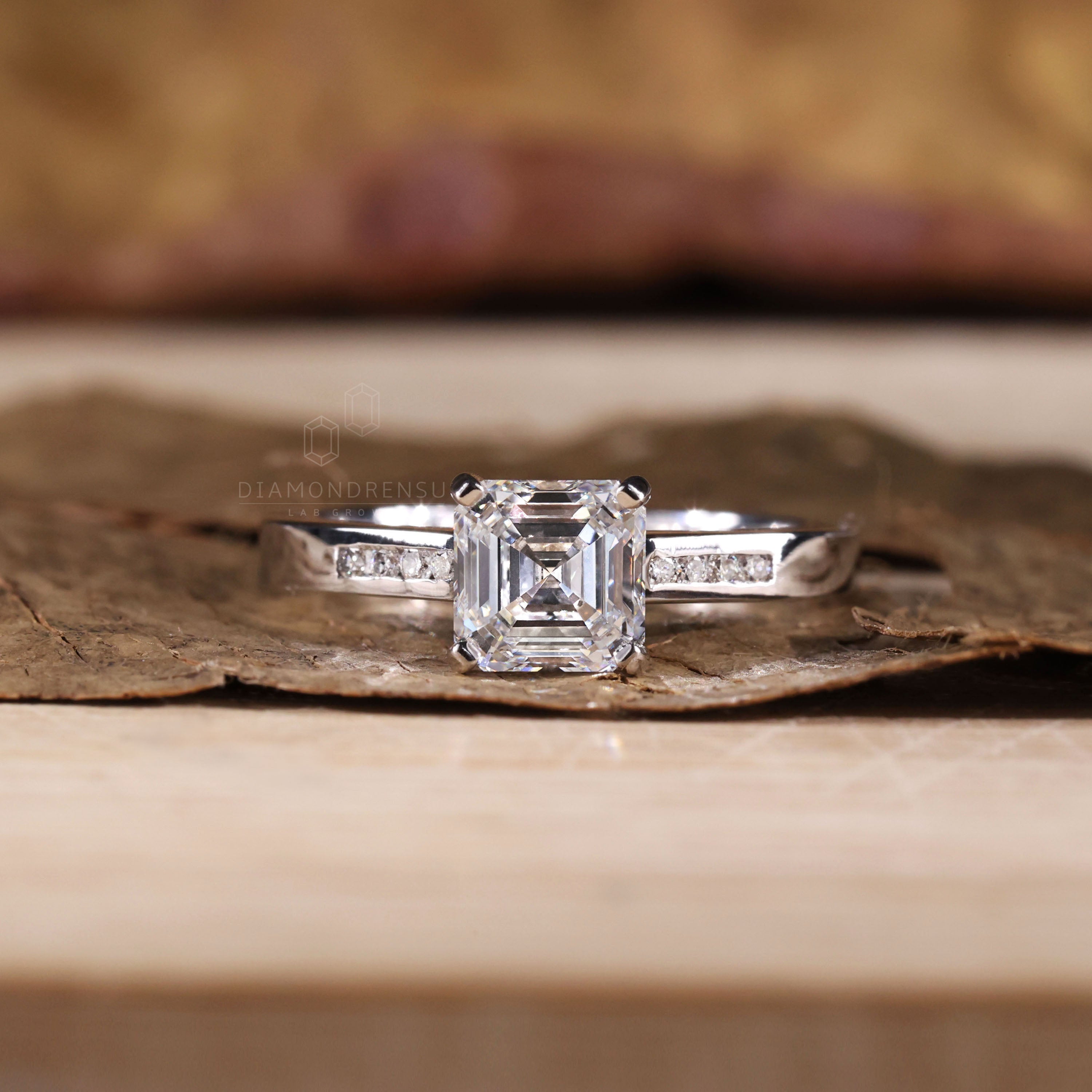 Channel set diamond ring crafted for timeless elegance.