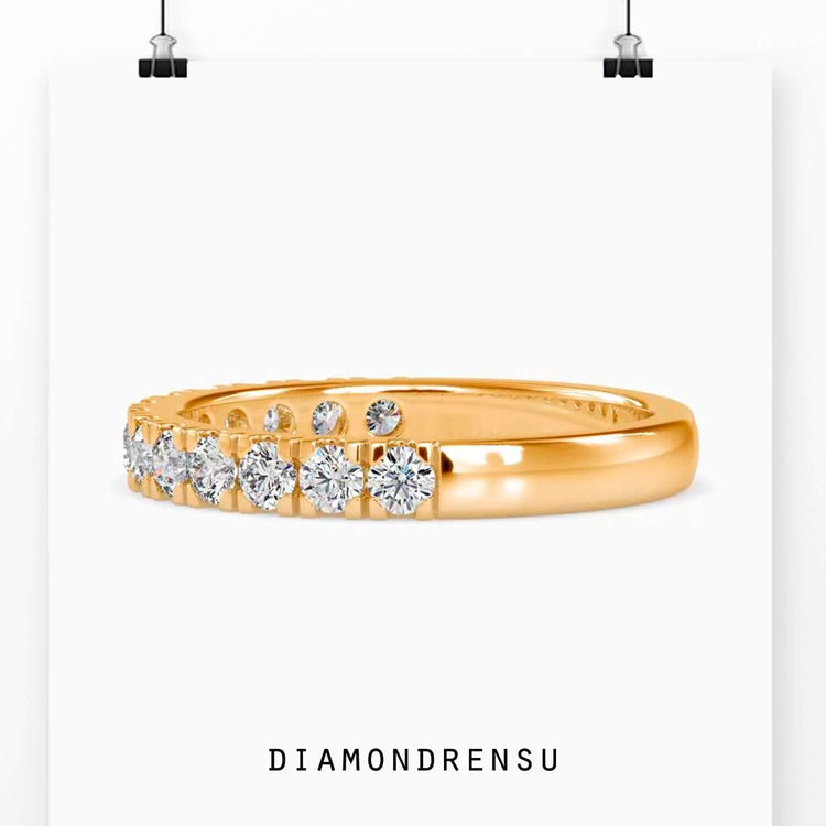 Wedding band UK made with diamond half eternity style.
