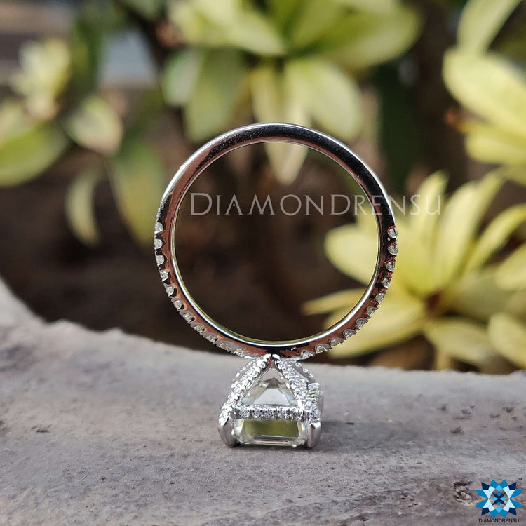 Handmade Asscher cut Moissanite ring with pave setting and 4 prong claw mount.

