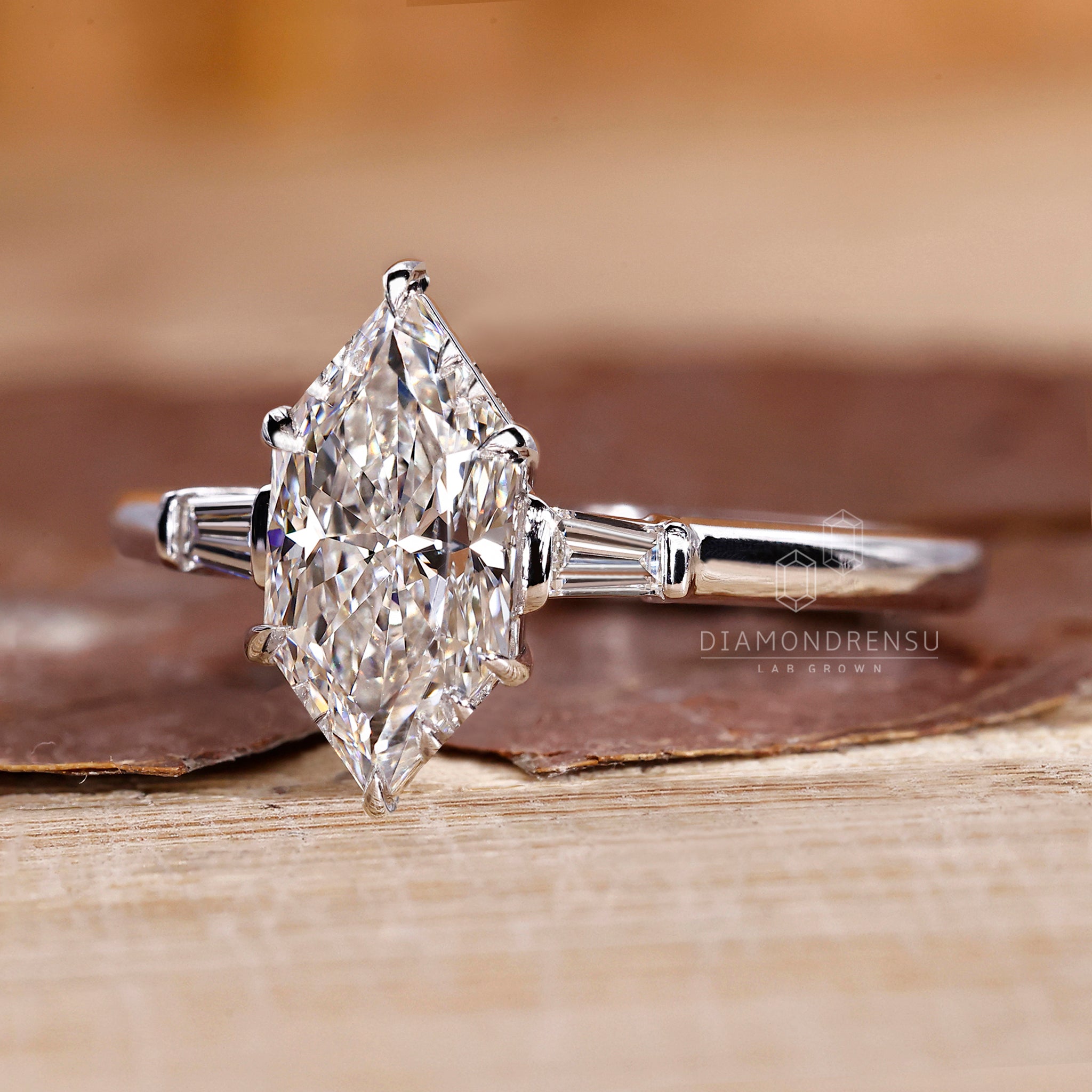 Designer engagement ring with custom three stone design.
