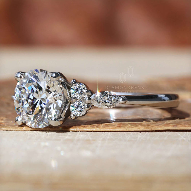 Unique engagement ring featuring Two Side Marquise Stones and a muse ring style for a bold, romantic look.