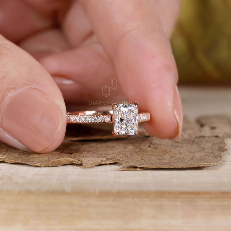 Handmade jewellery featuring a 4 prong diamond ring design
