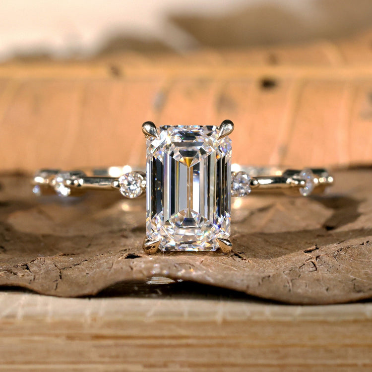 Elegant emerald engagement ring with a classic design.