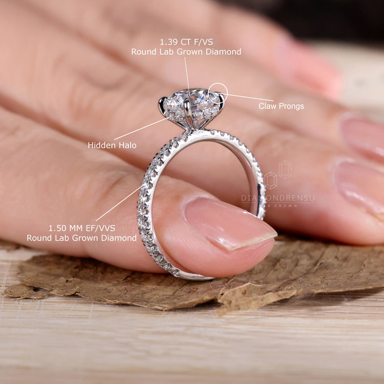 Round cut diamond ring paired with a classic claw prong setting.