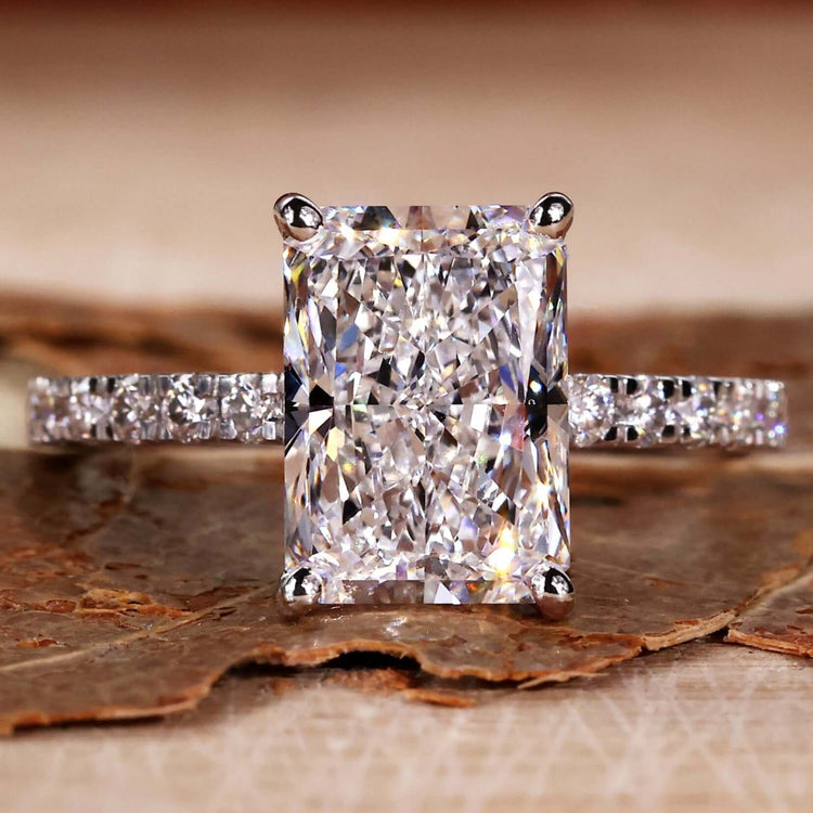 Radiant cut engagement ring featuring a brilliant radiant cut diamond with a classic design.
