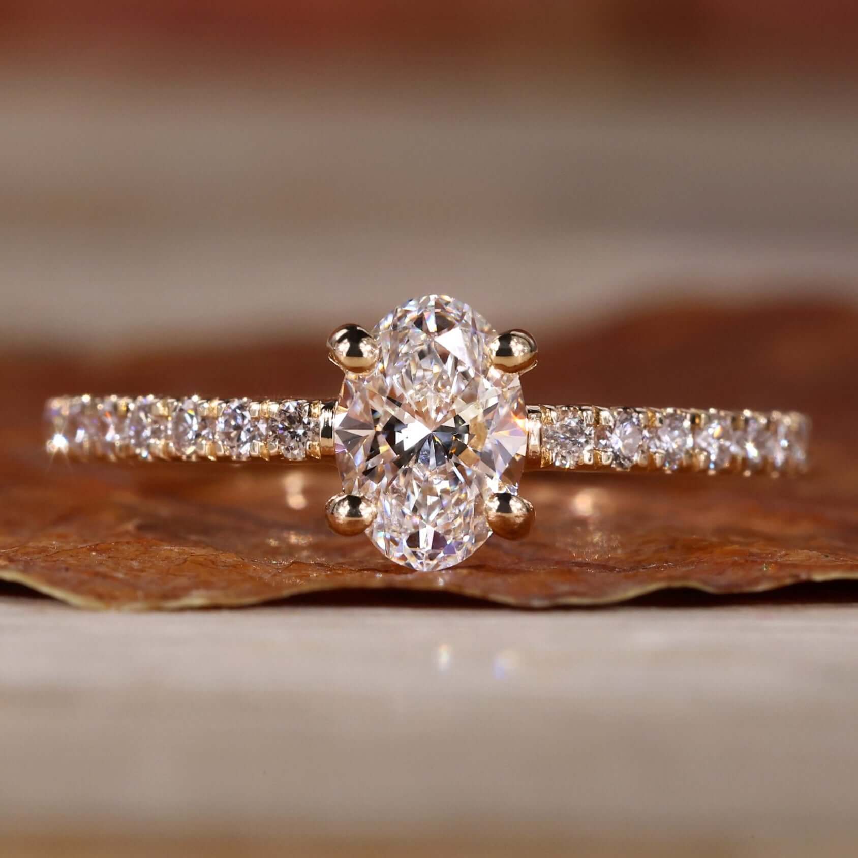 Oval diamond engagement ring with a stunning 4 prong diamond setting for timeless elegance.
