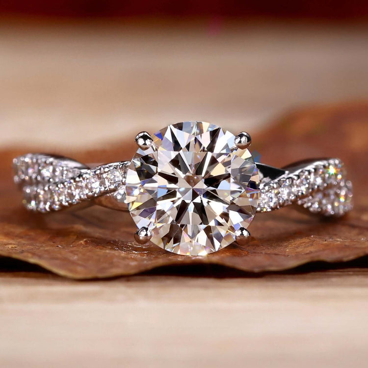 Elegant twisted diamond ring with sparkling accents for engagement.