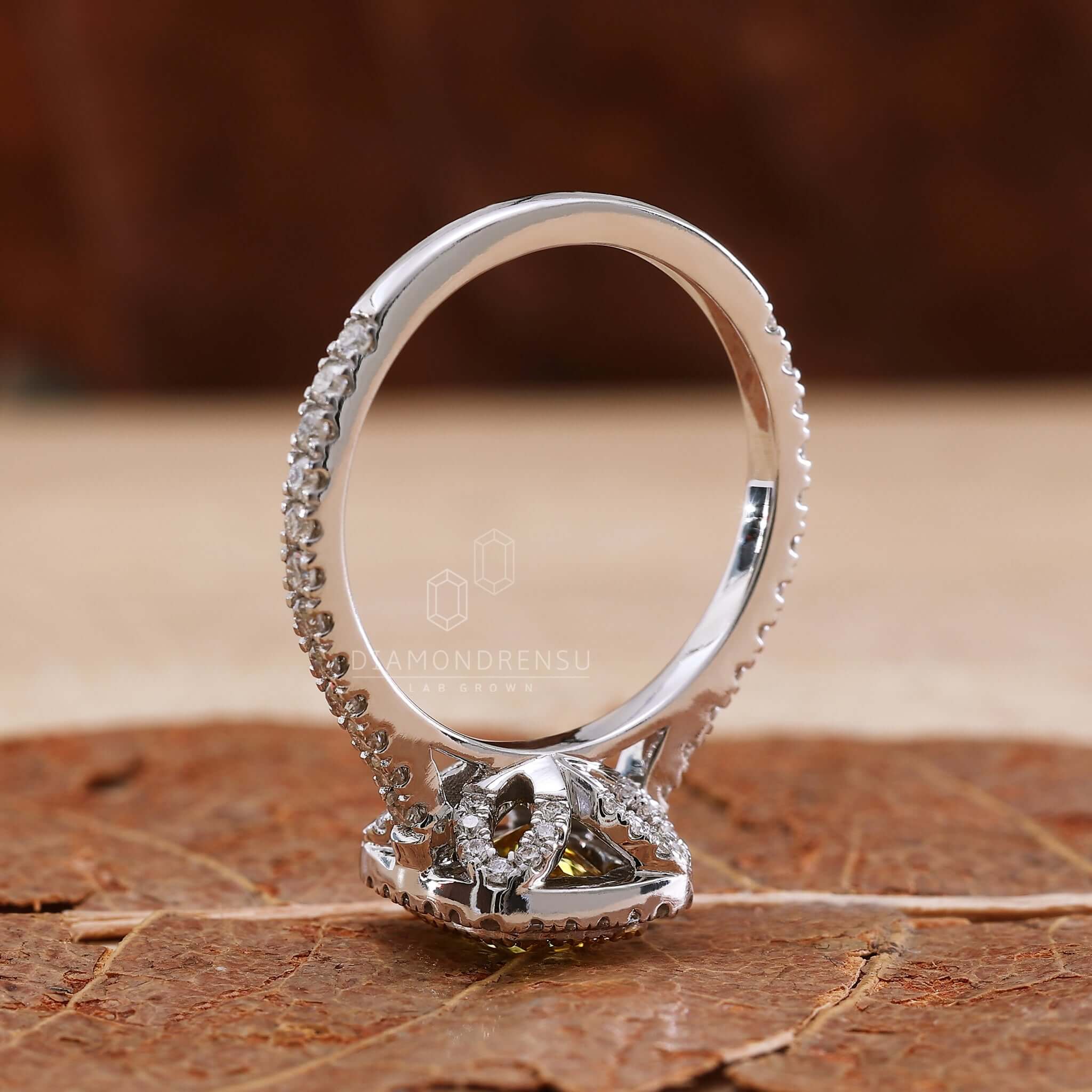 Handmade cushion cut diamond engagement ring with IGI certification.