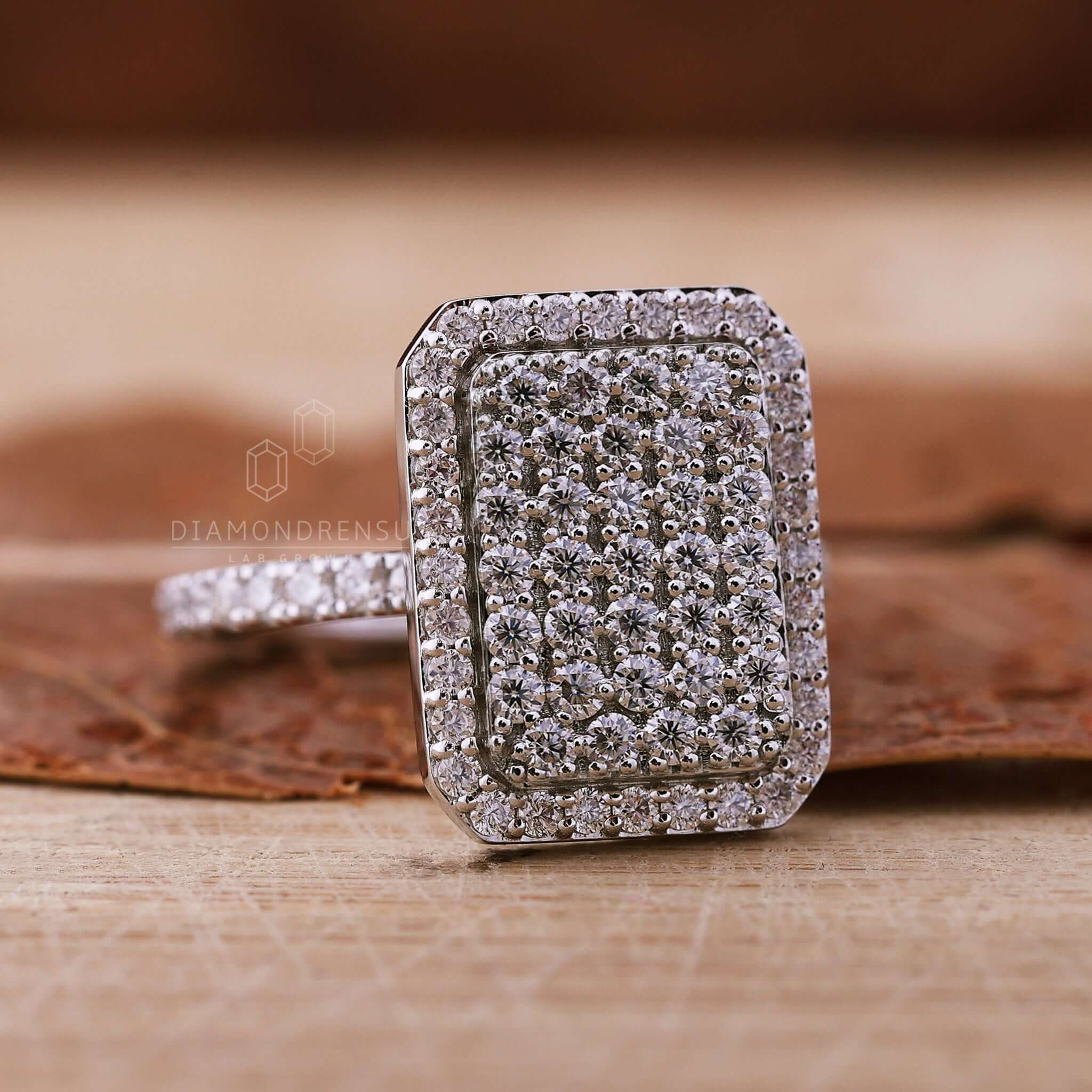 Round diamond ring featuring a radiant diamond halo and pave setting for an elegant uk engagement ring style.
