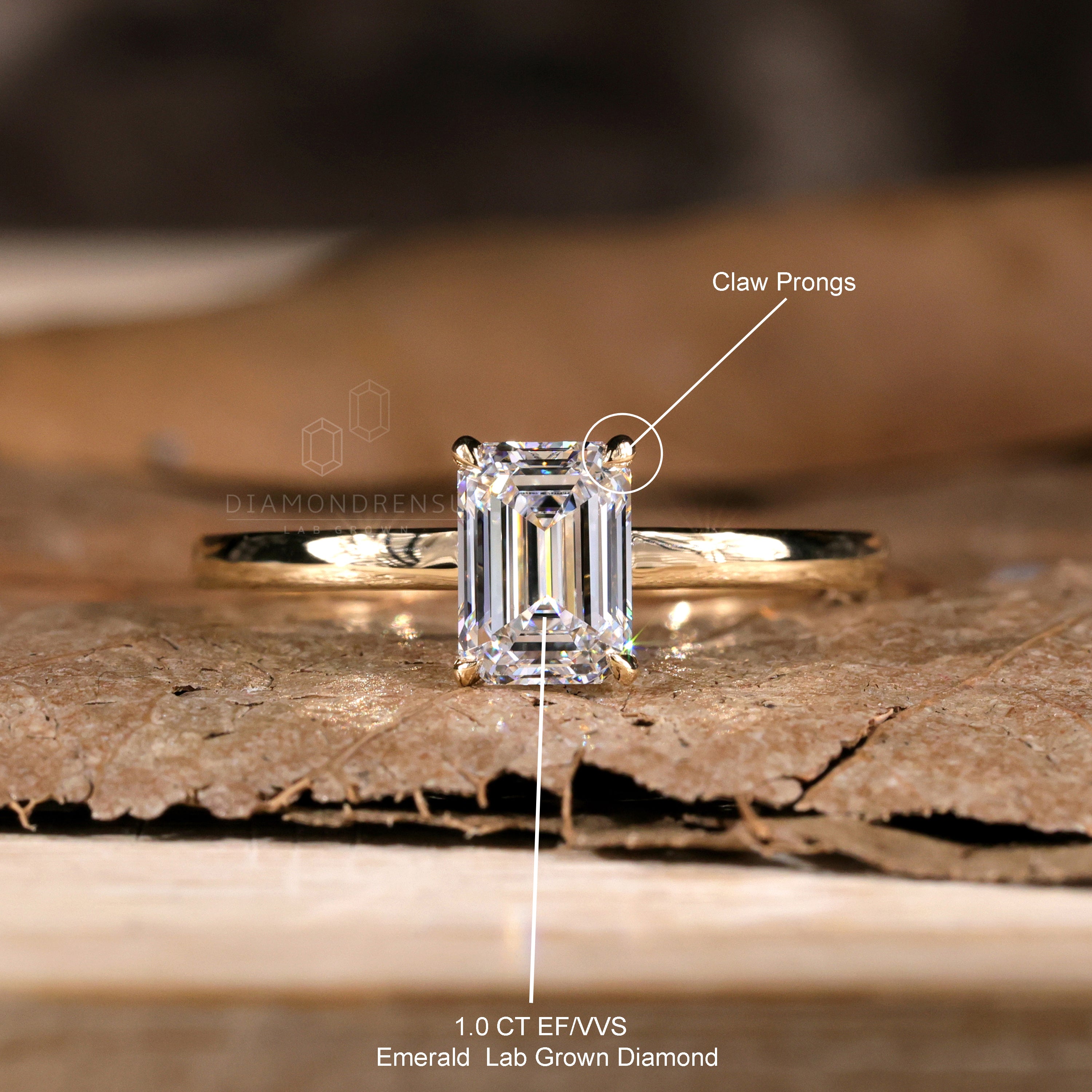 Solitaire emerald cut ring in a refined design.