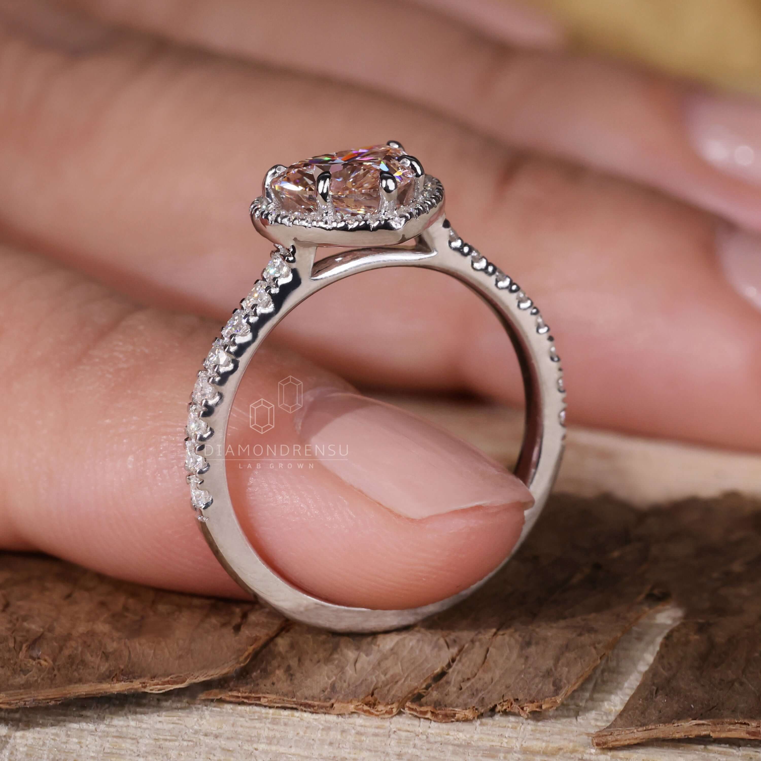 Heart shape ring diamond set in a classic cathedral setting engagement ring
