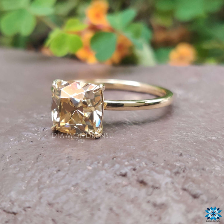 Solitaire setting ring with old European moissanite.
