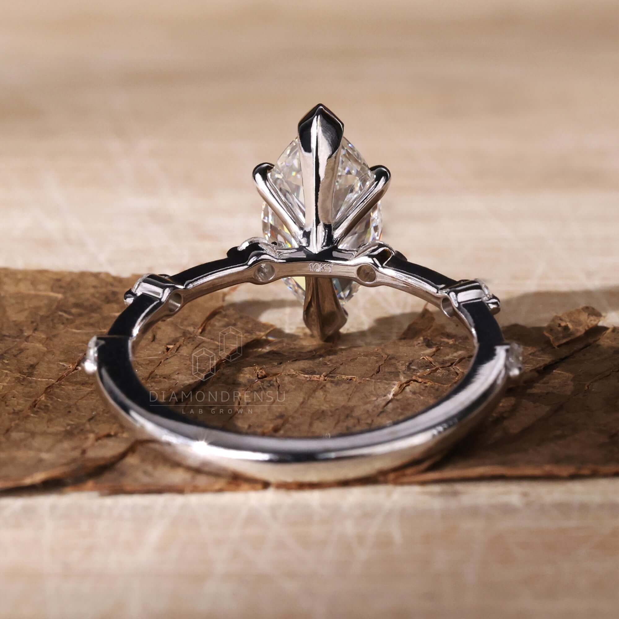 Handmade jewelry showcasing a marquise cut white gold ring.