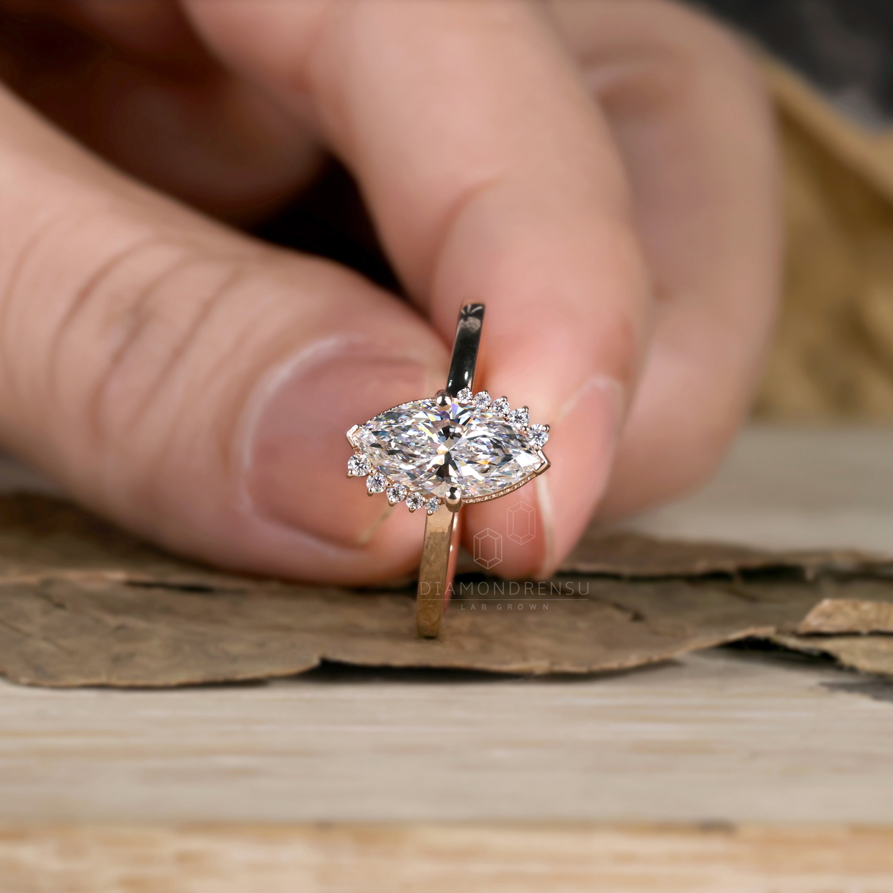 Marquise cut engagement ring with a stunning vintage halo design.