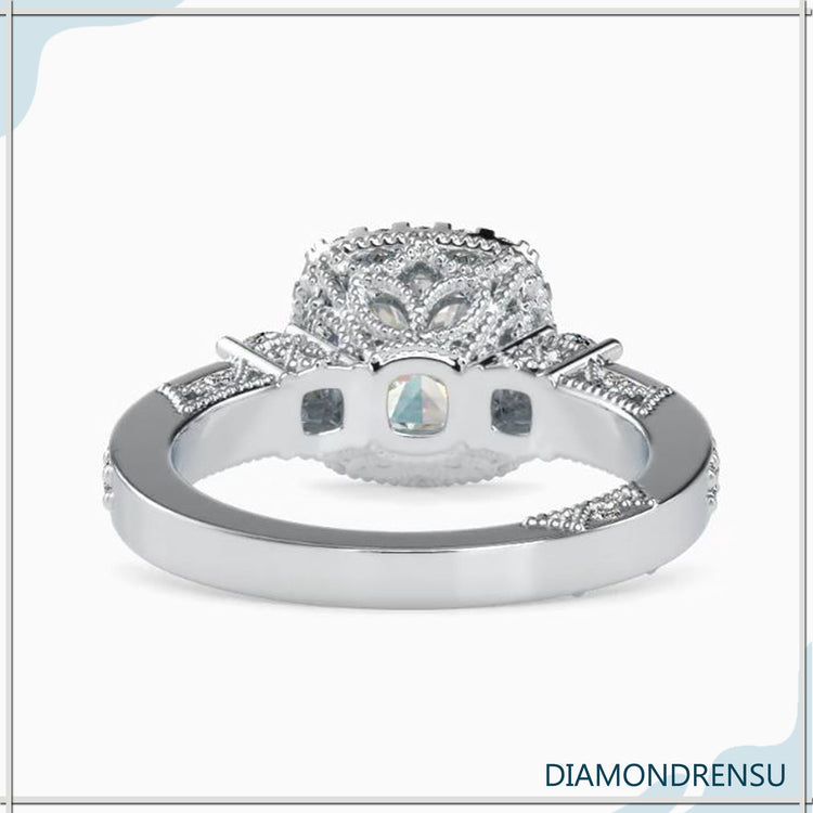 Yellow gold ring with round diamonds and double prong setting.
