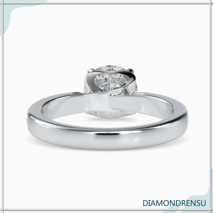 Lab grown diamond solitaire ring in rose gold with hidden heart.
