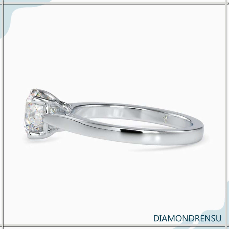 Yellow gold ring with simple solitaire round diamond.
