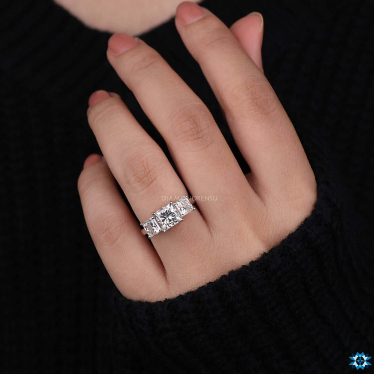 Princess cut engagement ring set in white gold.
