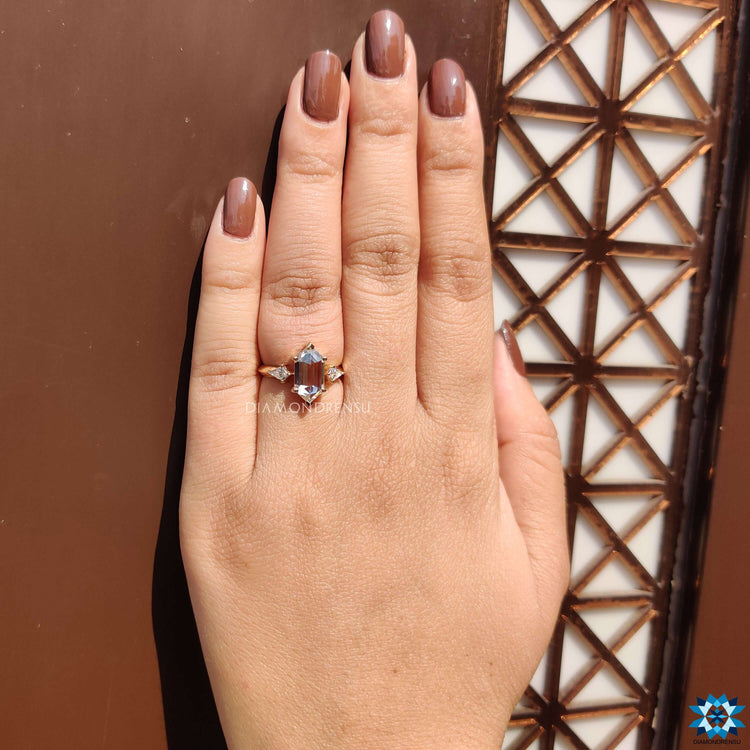 Handmade three stone moissanite ring.
