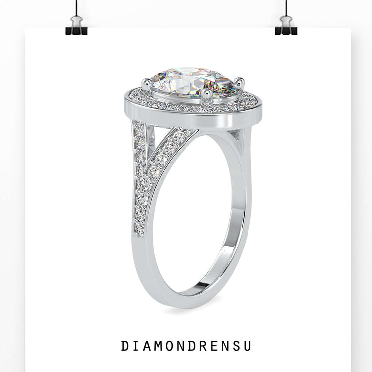 White gold engagement ring with vintage halo setting.

