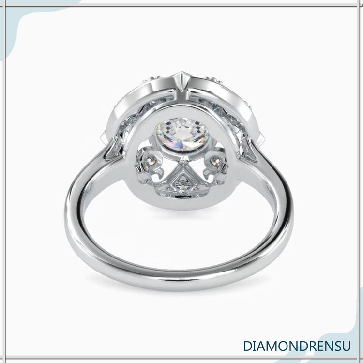 UK engagement ring in rose gold with round diamond and vintage setting.
