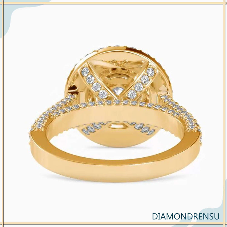 Rose gold engagement ring with round pave halo design.
