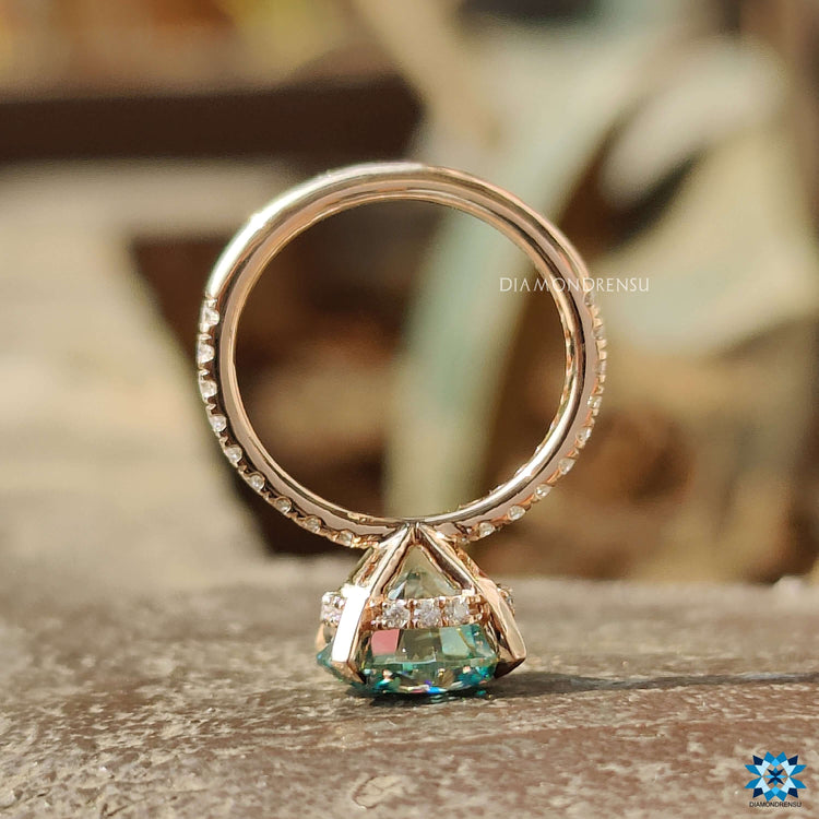 Custom handmade rose gold engagement ring with hidden halo.
