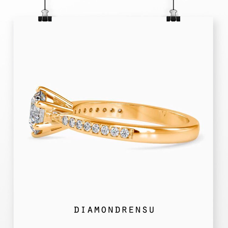 Diamondrensu UK engagement ring with round cut pave diamonds.
