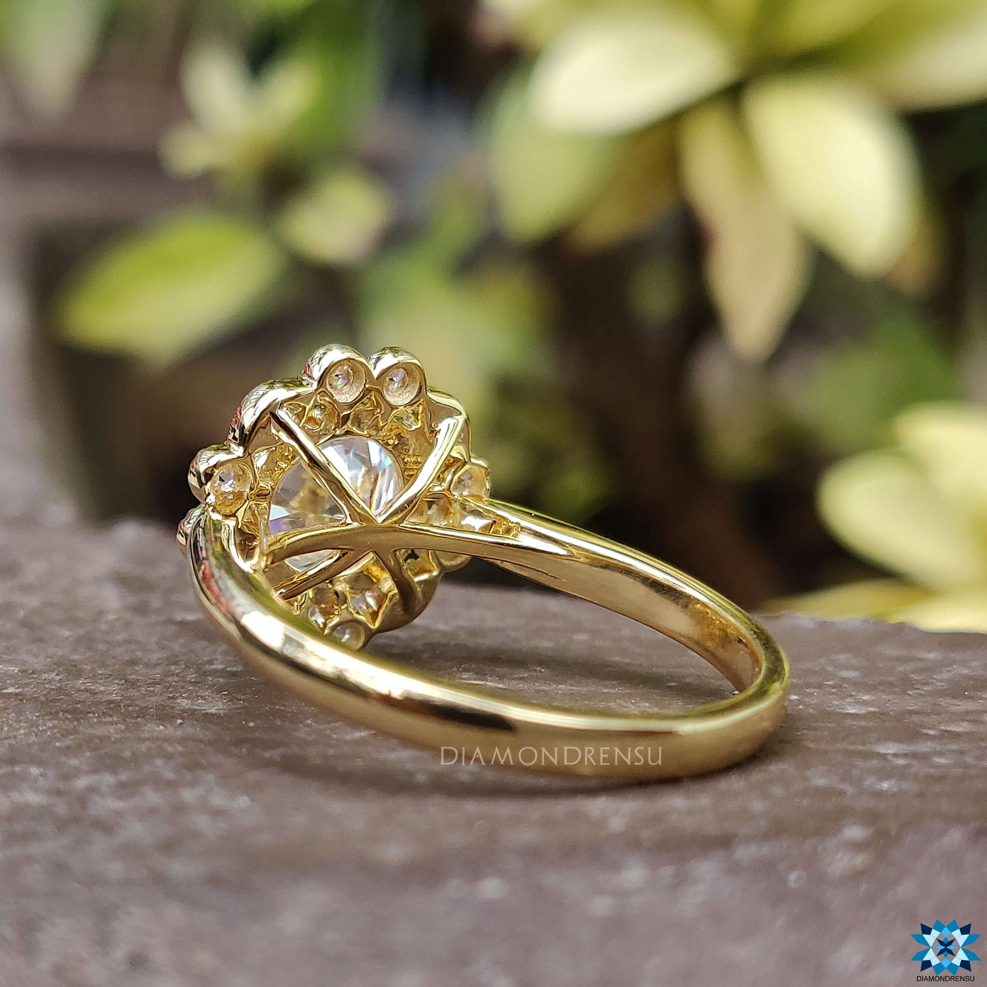 Milgrain ring with a round brilliant cut moissanite for a vintage touch.