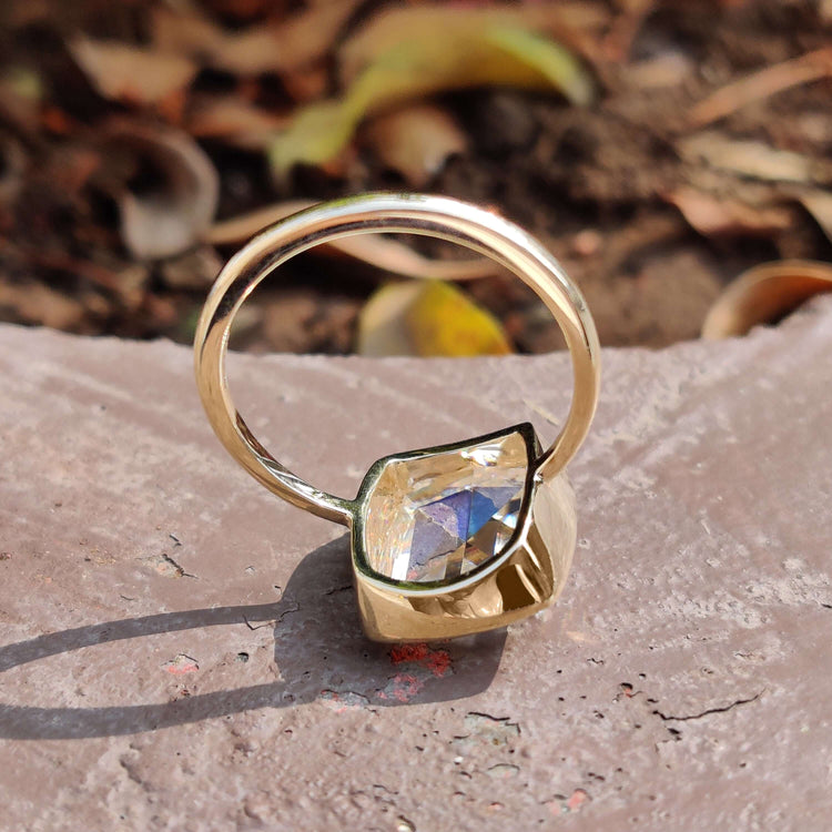 Custom engagement ring with cushion rose cut center.
