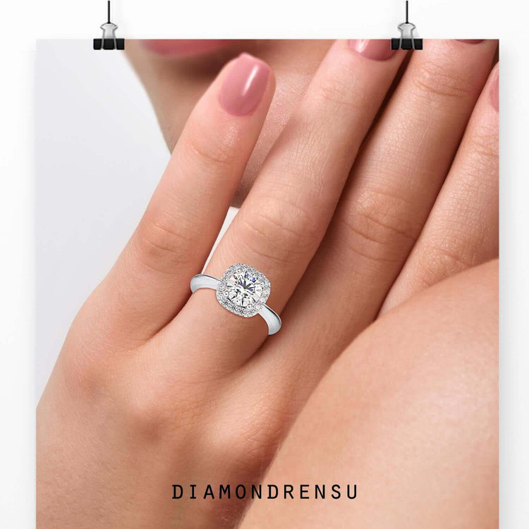 Round cut engagement ring with round prong setting in rose gold.
