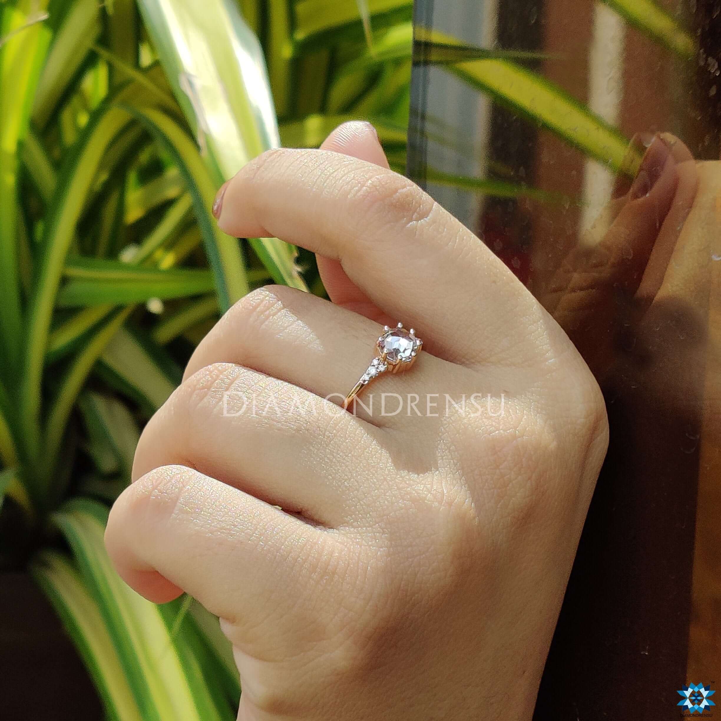 Gorgeous rose gold promise ring with a round rose cut moissanite engagement ring centre.