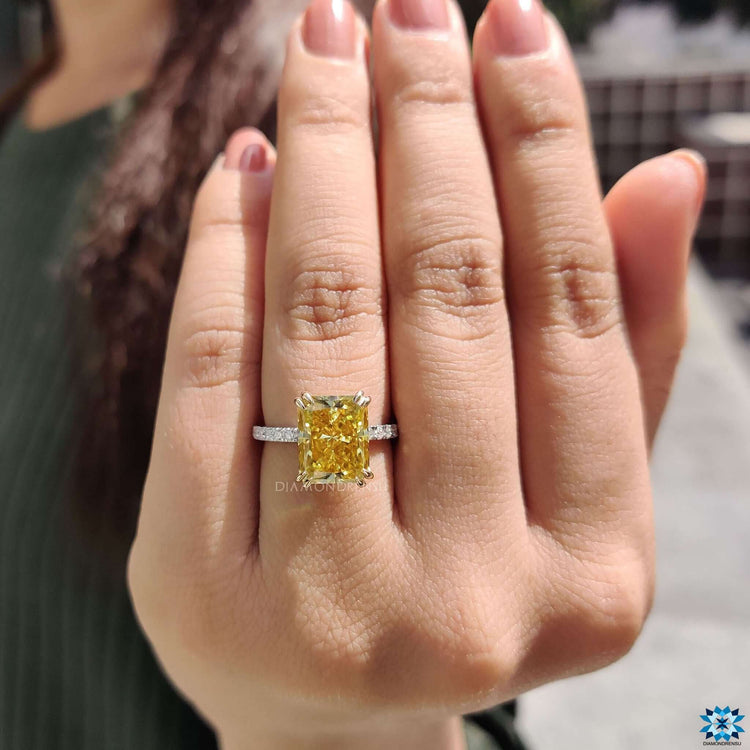 Custom moissanite ring featuring hidden halo design.
