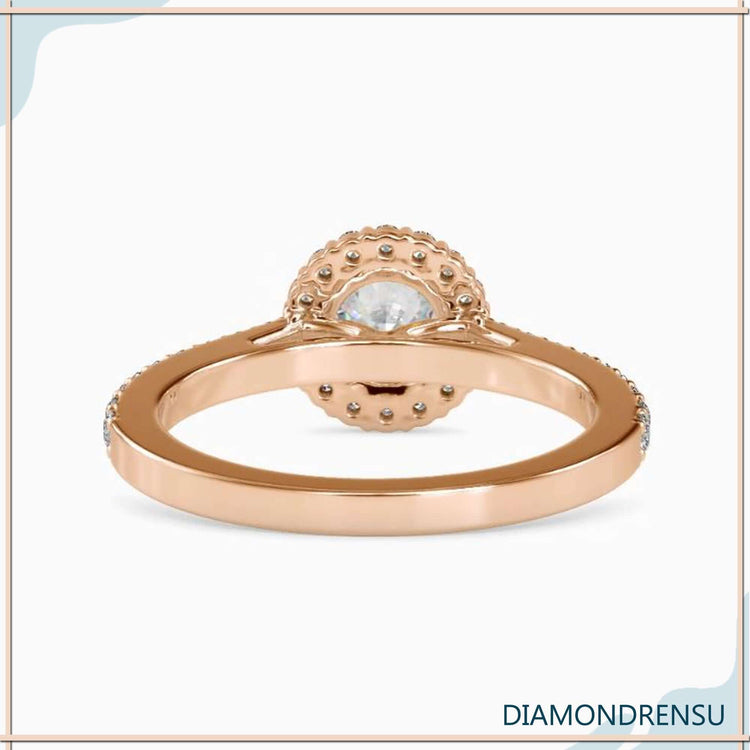 White gold diamond ring showcasing a lab grown diamond centre.
