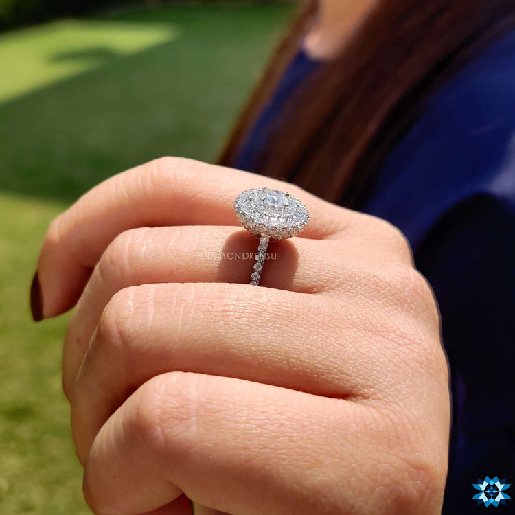 Claw prong setting ring with double halo moissanite.
