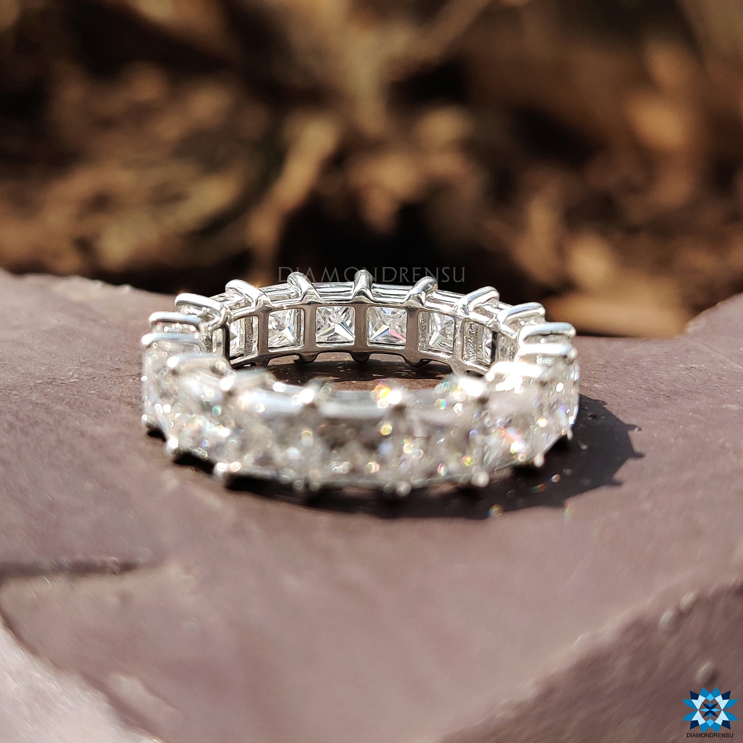 Moissanite princess cut wedding band, perfect for those seeking a sustainable and luxurious alternative to diamonds.