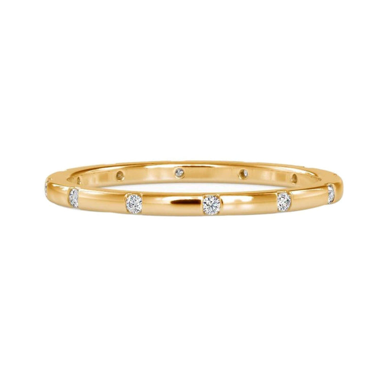 Eternity wedding ring with round cut lab grown diamonds.
