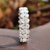 Handmade oval diamond eternity band designed for lasting elegance.