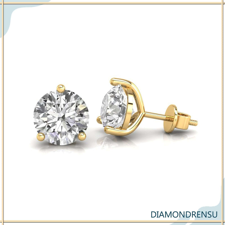 Lab grown diamond earrings in gold stud format.
