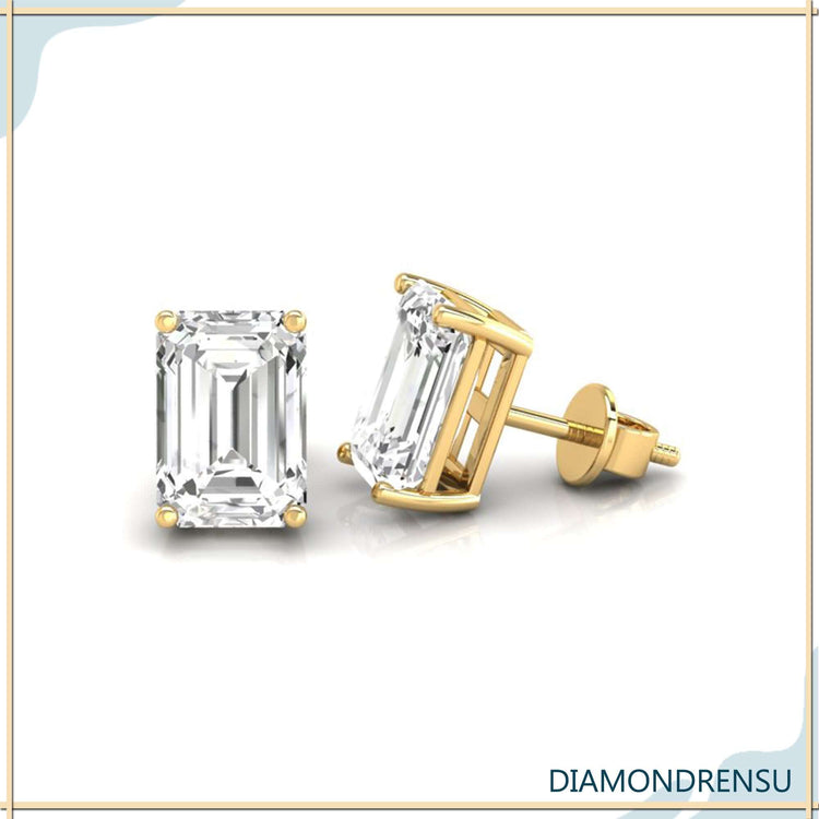 Diamond stud earrings featuring emerald shaped stones.
