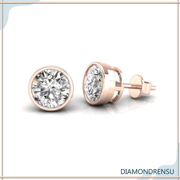 Rose gold bezel diamond stud earrings crafted by Diamondrensu UK.
