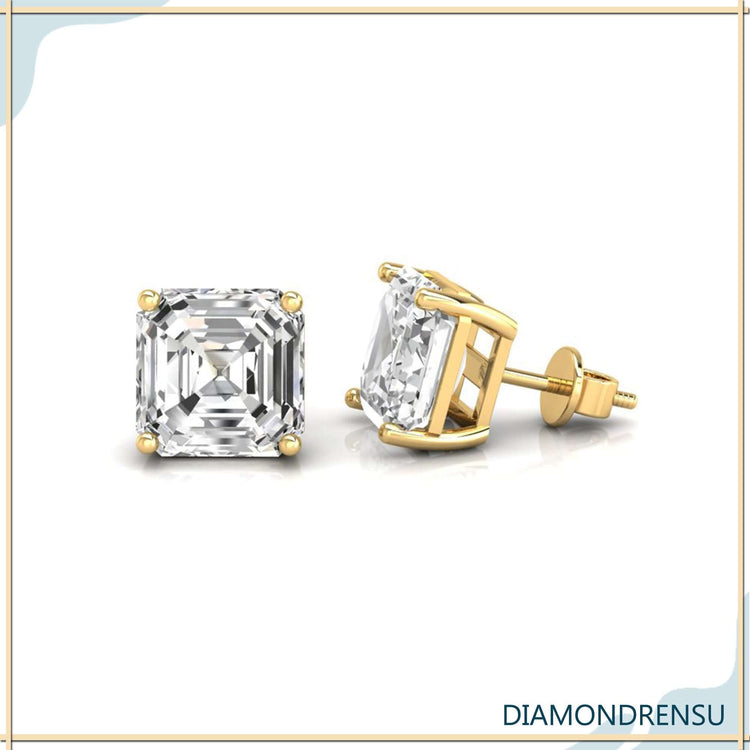 Gold diamond earrings in classic stud style.
